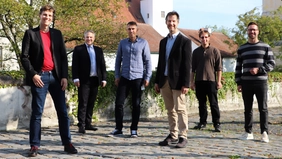 Group of people in front of the castle